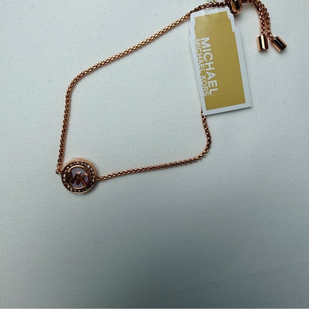 Michael Kors Elegant Gold Bracelet with Logo Charm rose gold color - Picture 9 of 11